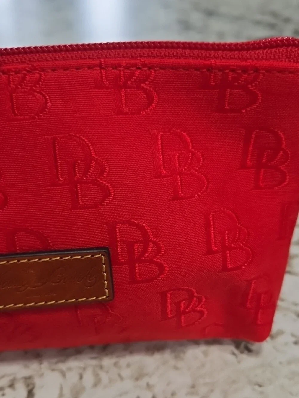 Dooney & Bourke Red Embossed Logo Cosmetic Pouch